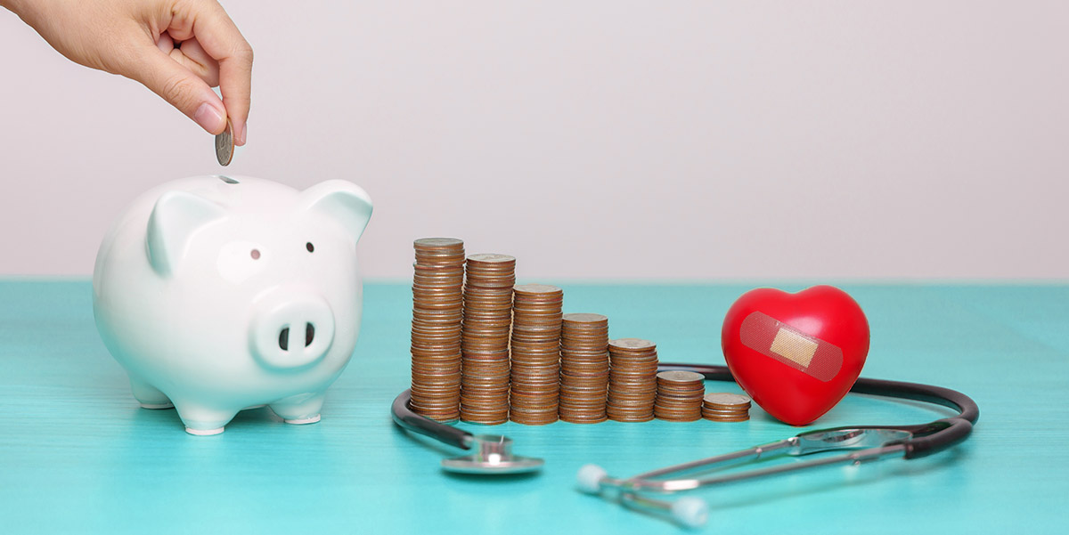 Ha inserting coin into piggy bank with tiered stacks of coins, red squeeze heat and stethoscope.